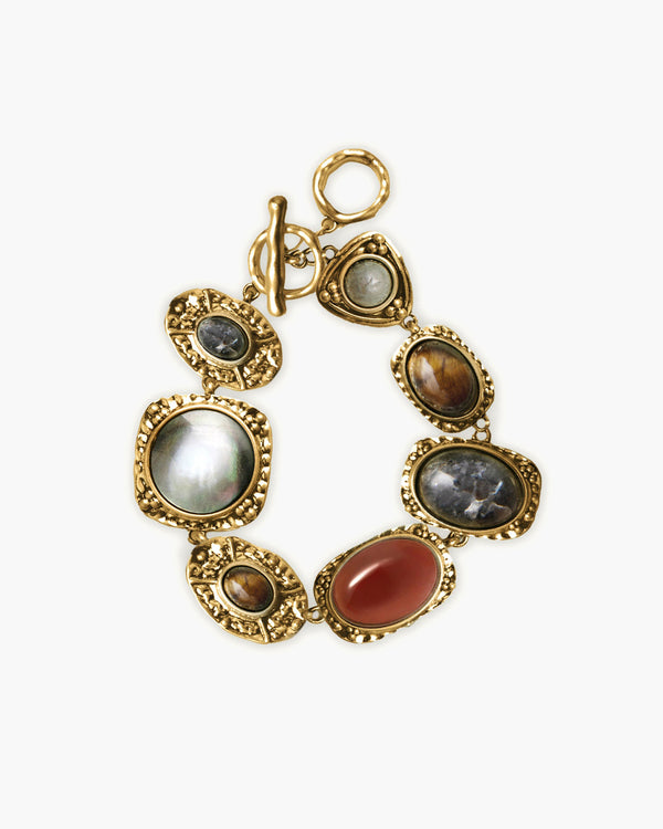 Athena Bracelet in Gold from en route jewelry on a solid white background, which is the exact style as seen on actress Mika Abdalla while promoting the hit TV series Off Campus.
