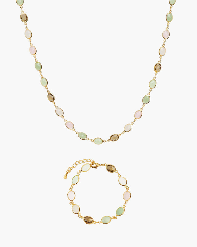 Whimsical Romance gold necklace and bracelet set with pastel stones