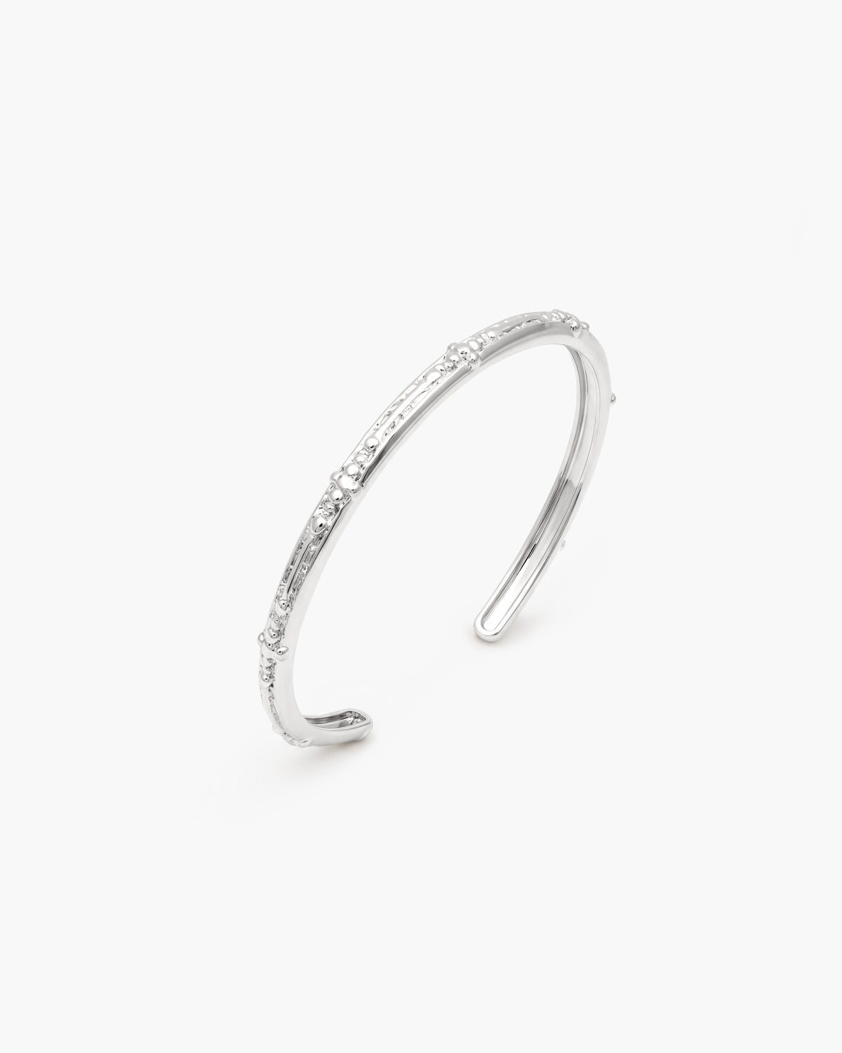 Vågig strukturarmring i silver