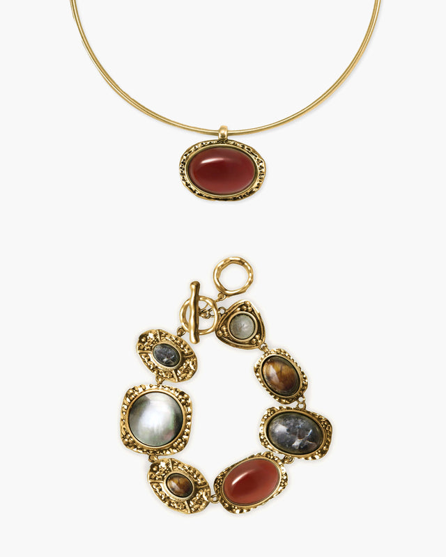 Venus Collar Necklace & Athena Bracelet Set in Gold from en route jewelry on a solid white background, which is the exact style as seen on actress Mika Abdalla while promoting the hit TV series Off Campus.