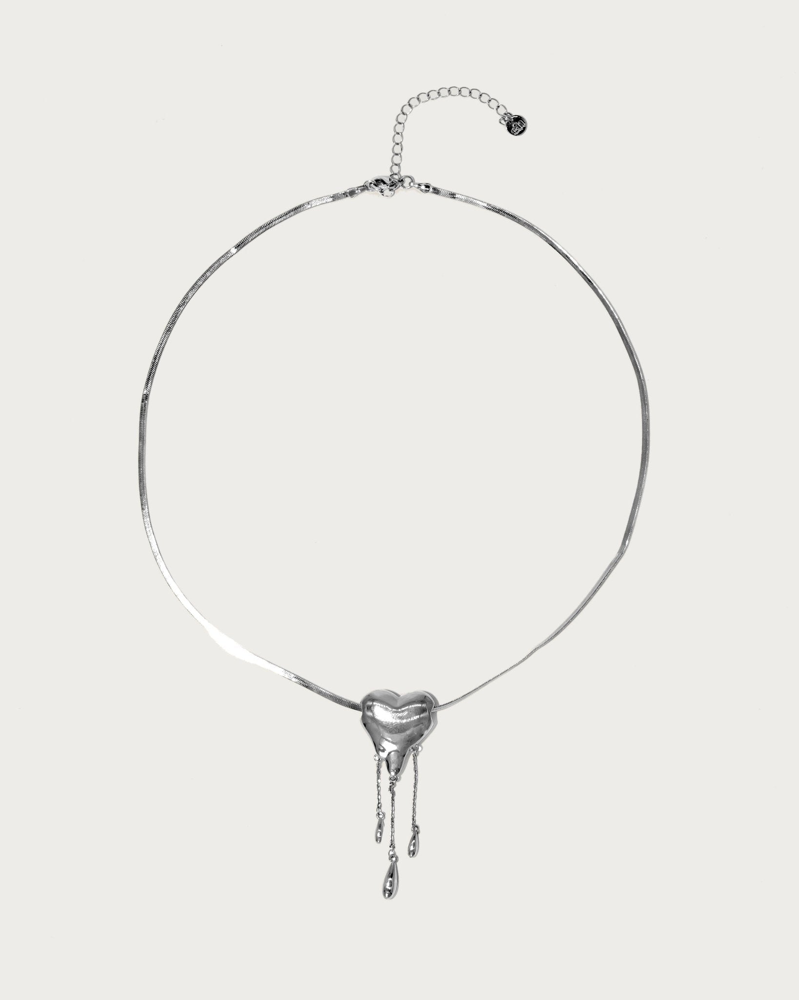 Venom's Golden Drip Heart Necklace in Silver