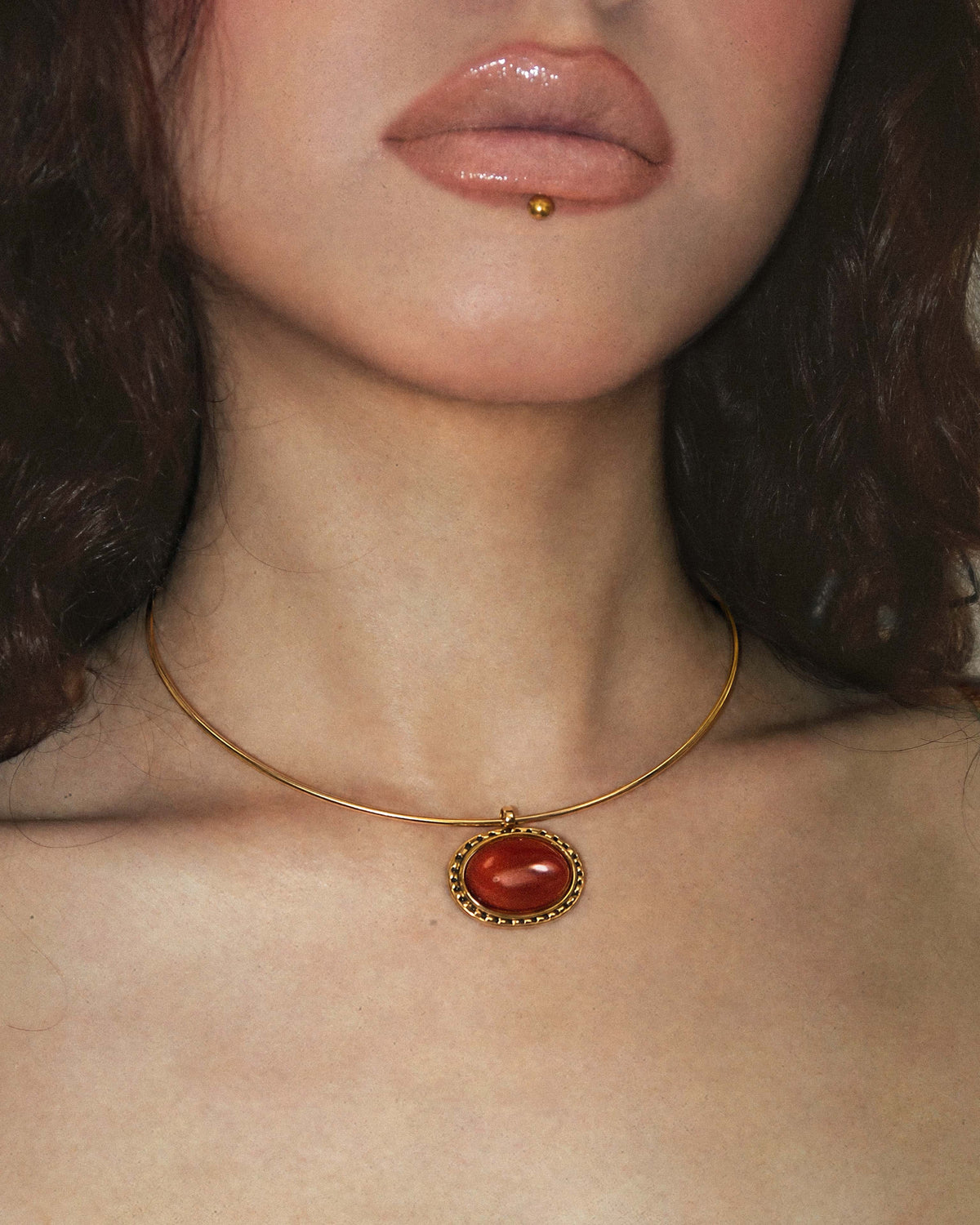 Model showcasing Venus Collar Necklace in Gold from en route jewelry on a solid white background, which is the exact style as seen on actress Mika Abdalla while promoting the hit TV series Off Campus.