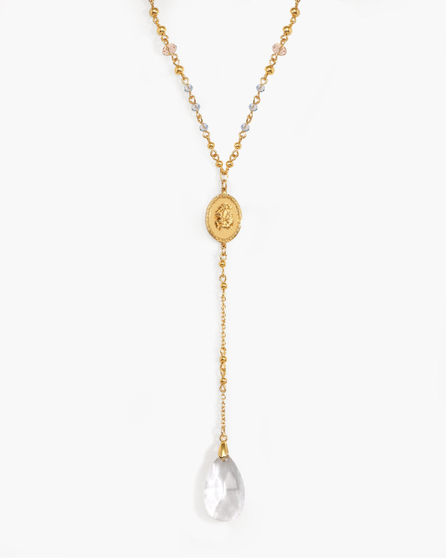 Dear Diary Necklace: Gold-tone Y-necklace with embossed locket and crystal teardrop pendant.