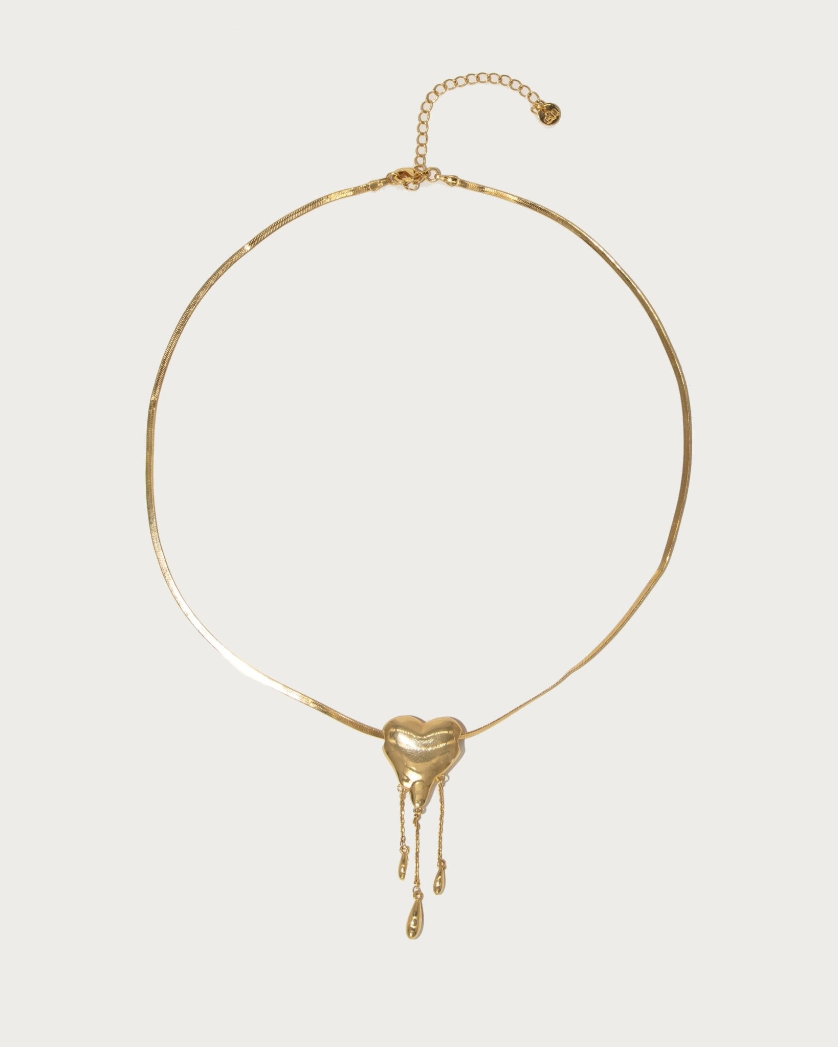 Venom’s Golden Drip Heart Necklace in Silver
